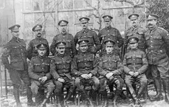 Sergeants Mess, Spring 1917 - Back Row: Shapland (E-sub), Higgs (B-sub), Rivers (A-sub), Sherriff (F-sub), Baker (C-sub), Webber (D-sub), Fitter Sgt Betty - Front Row:Farrier Sgt. Burnett, BQMS Frost, BSM Blackman, Saddle Sgt. Loxton, Sgt. Savage (AVC)